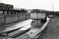 A compartment boat on a rail bogie circa 1920.