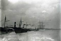 Two steamships and a sailing vessel entering the lock leading to Goole Docks.