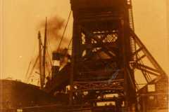 A steam collier alongside Goole's No 2 Compartment Boat Hoist.