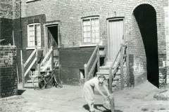 Drawing water from a stand pipe, Goole