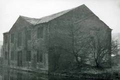 A Huddersfield Broad Canal stone-built warehouse.