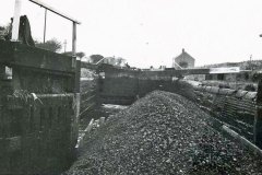 The barge Elizabeth B entering Figure of Three Bottom Lock in Horbury Basin.