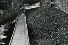 A motor barge entering Millbank Lock, near Dewsbury.