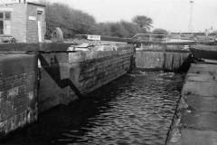 The damaged gates of a canal lock.