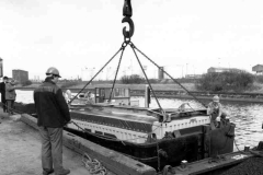 Compartment boat loaded with a container