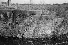 A canal brick wall