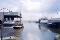 The sailing vessel Audrey passing down the centre of a Goole dock.