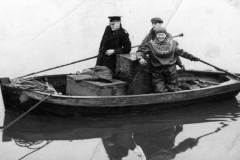 Diver aboard a rowing boat