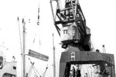 Discharging packaged timber in Goole Docks.