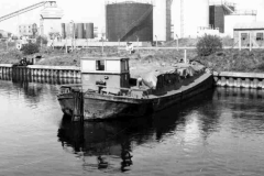 Barge alongside a fuel depot